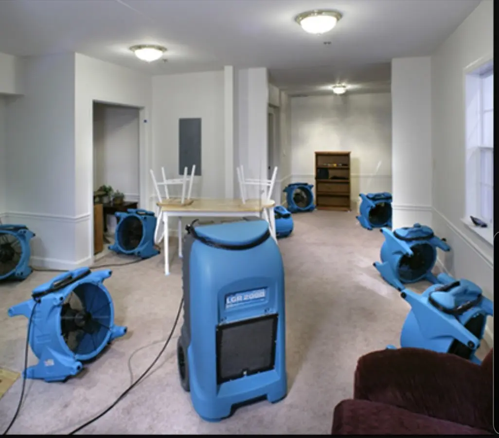 Air movers and dehumidifier setup for Water Damage Restoration in Salem Lakes